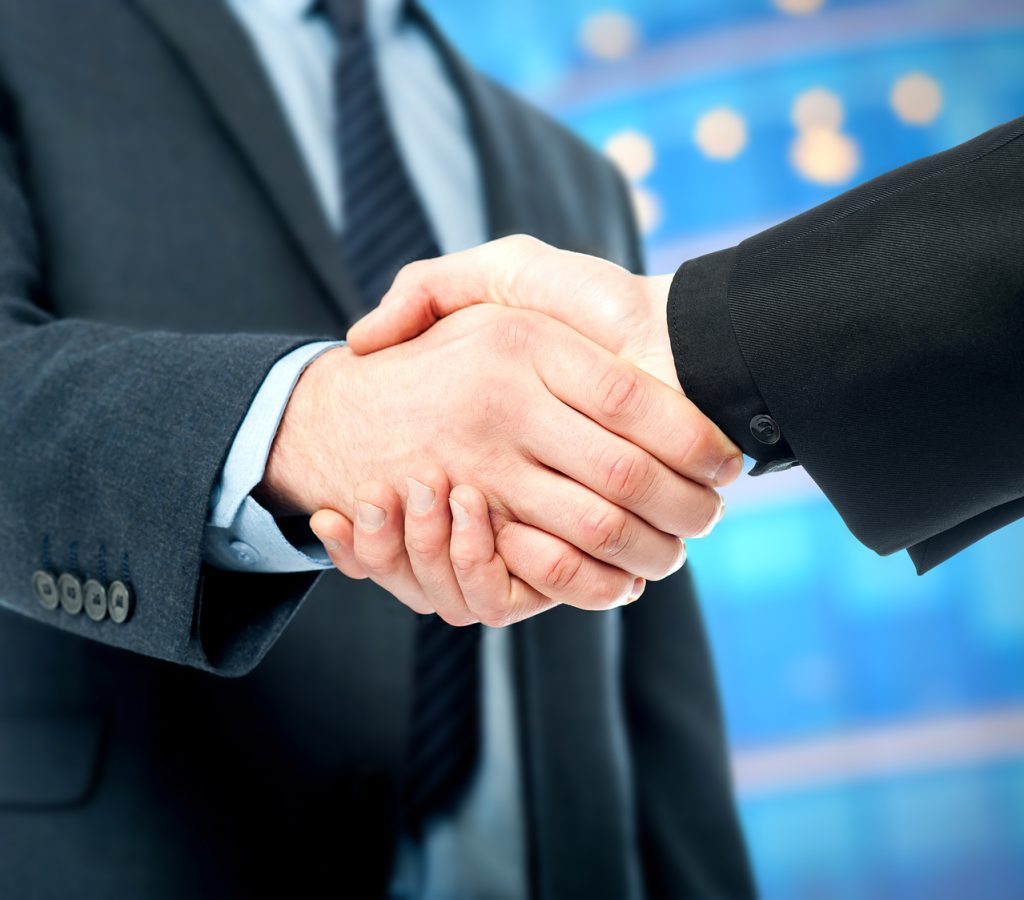 Business handshake, the deal Is finalized